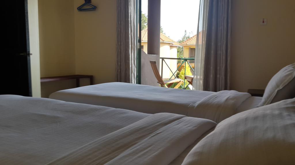 Nile Village Hotel&Spa Jinja Rum bild